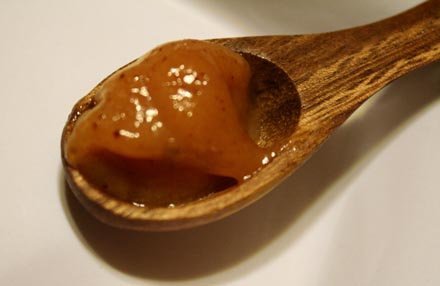 spicy mustard on spoon